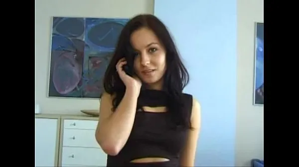 Show Cute brunette on couch drive Videos