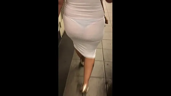 Vis Wife in see through white dress walking around for everyone to see drive-videoer